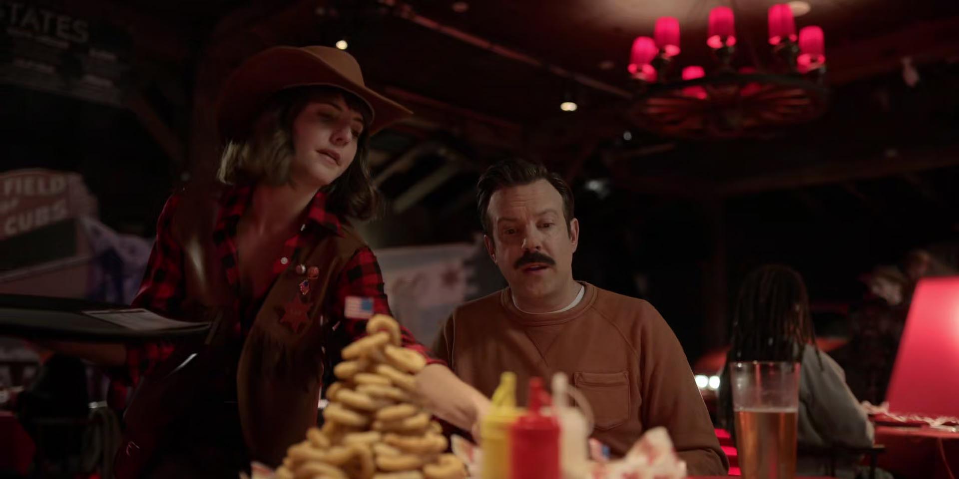 Ted Lasso Image Here's your onion ring pyramid and your freedom fries.